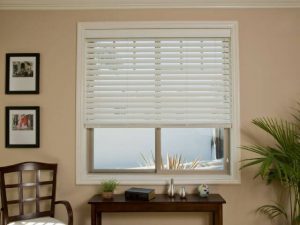 Faux Wood window blinds, in white.